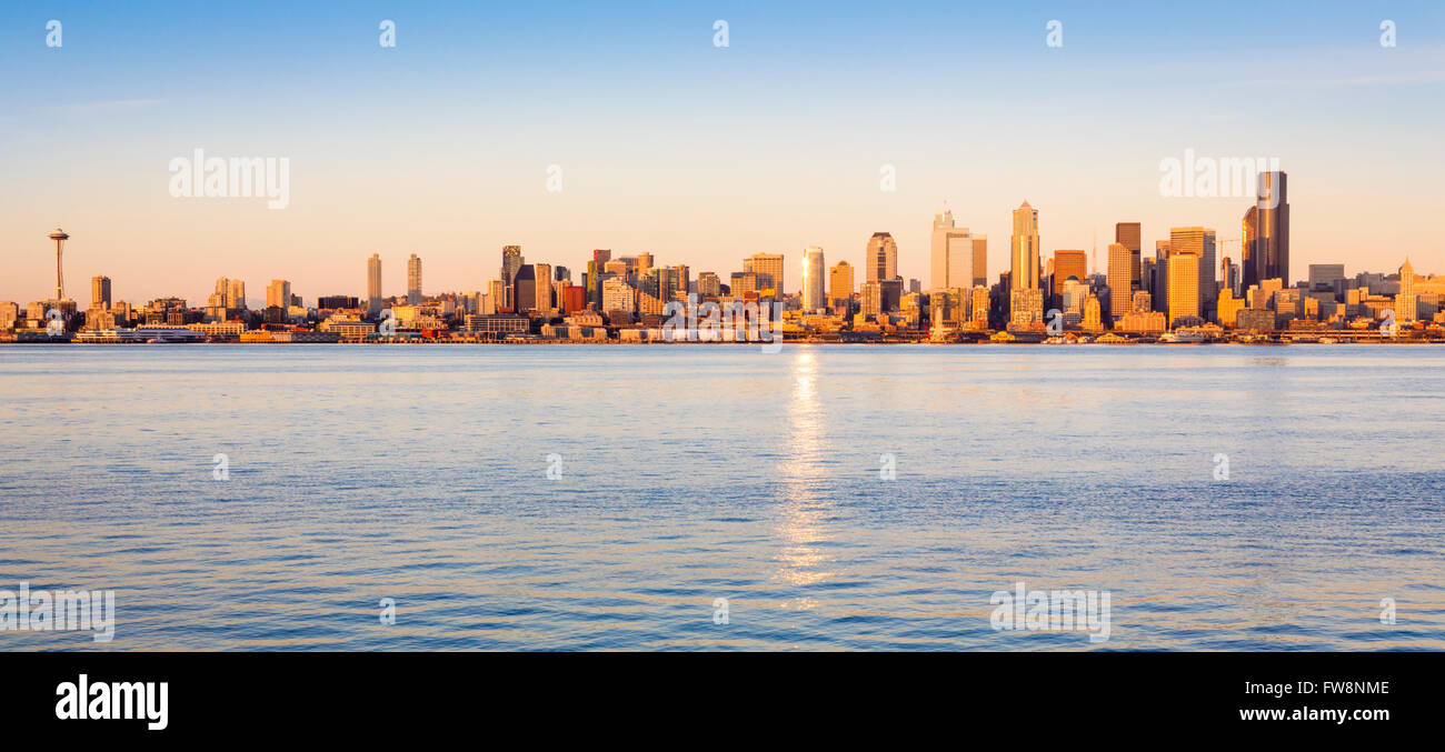 Seattle skyline panorama with Space Needle and Elliott Bay waterfront at sunset, Seattle, Washington, USA Stock Photo