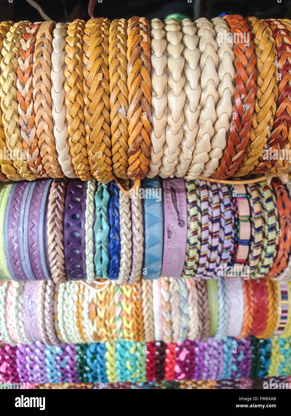 display full of handcrafts colorful bracelets Stock Photo