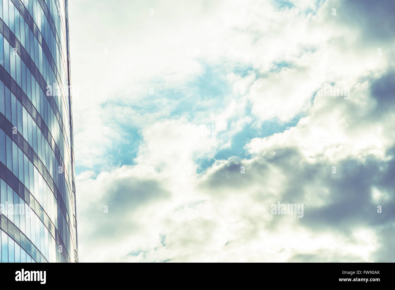office building against blue sky Stock Photo - Alamy