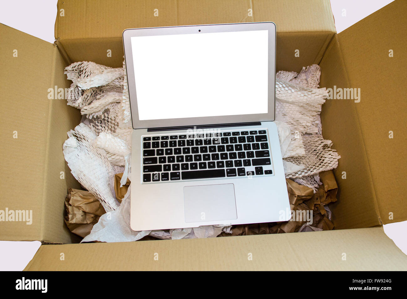 Shopping and unboxing new laptop computer Stock Photo - Alamy