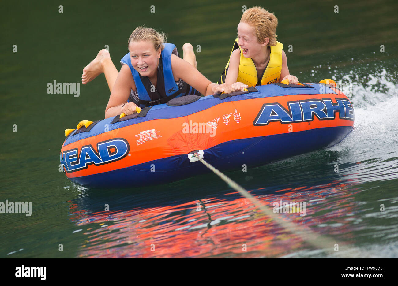 Tubing on Lake Jocassee during pontoon boat tour of the waterfalls in