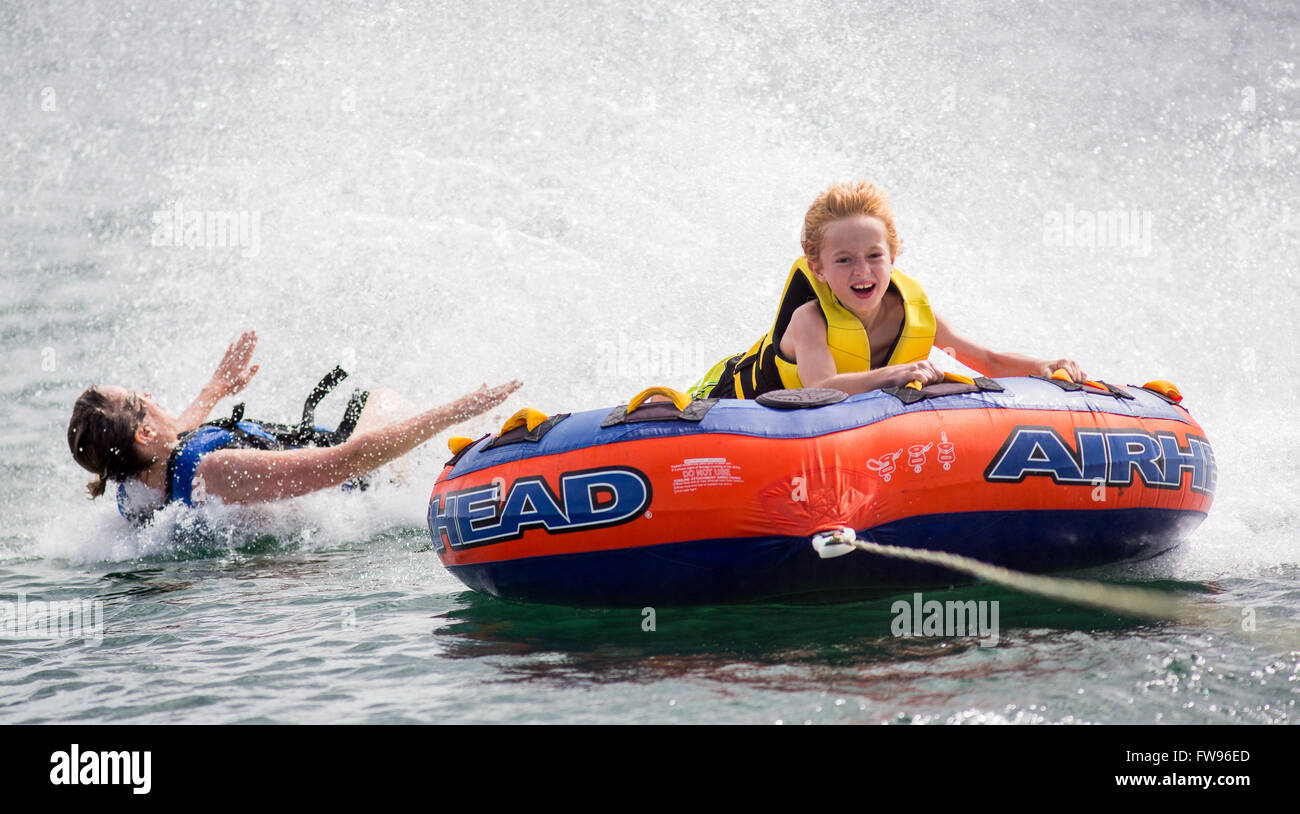 Tubing on Lake Jocassee during pontoon boat tour of the waterfalls in