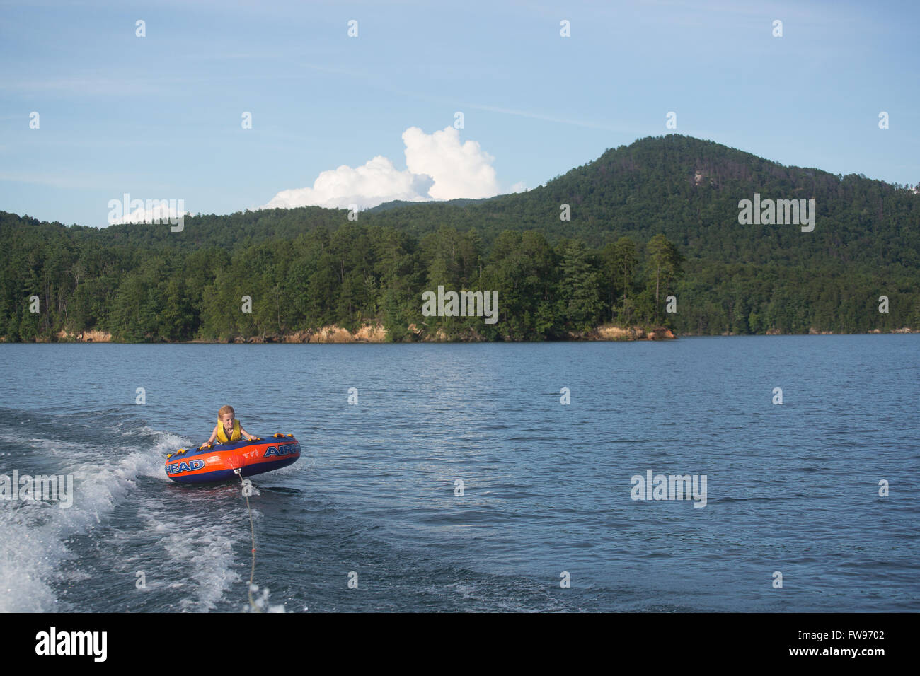 Tubing on Lake Jocassee during pontoon boat tour in Upstate South