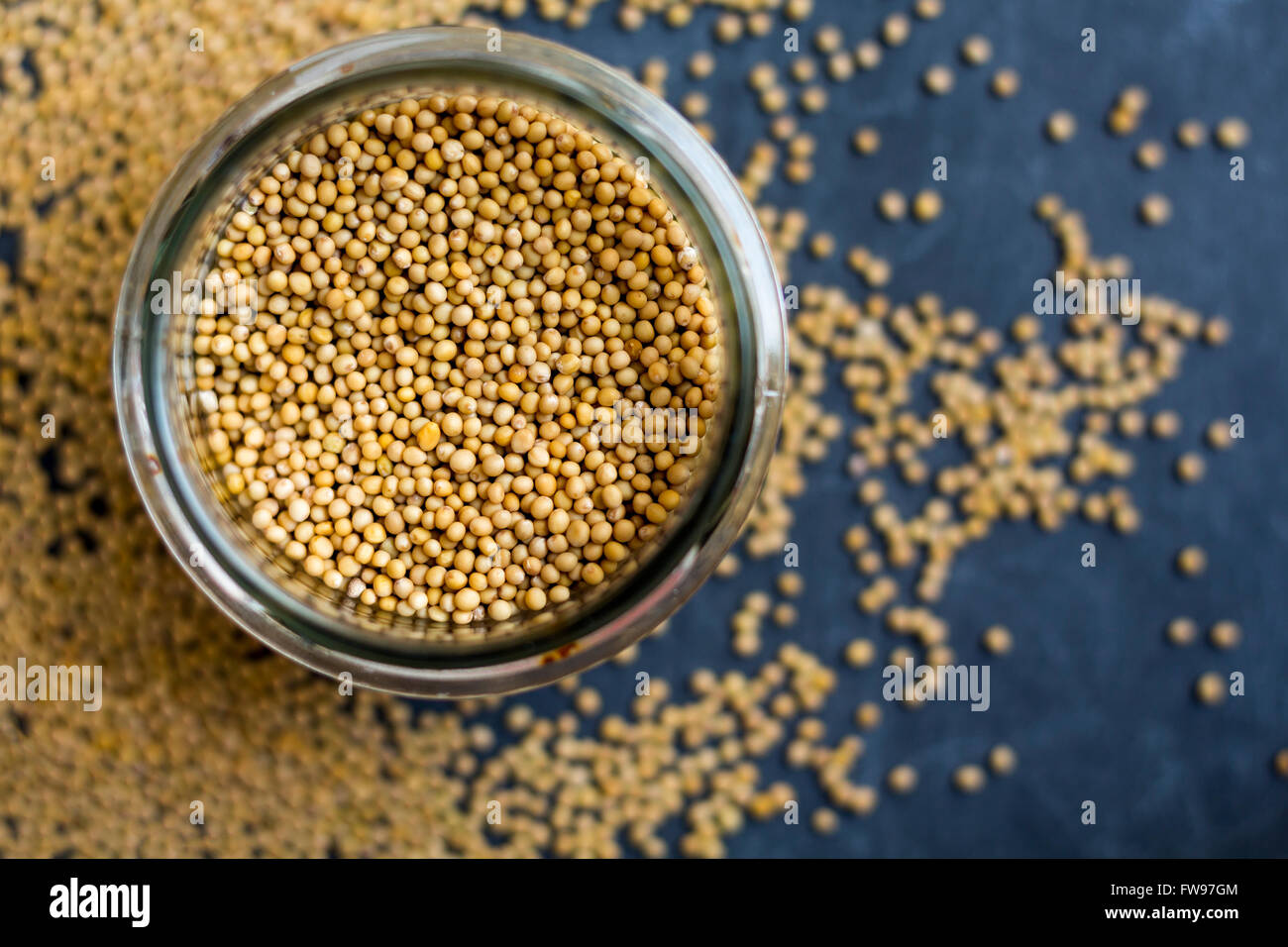 Mustard seeds in a jar Stock Photo Alamy