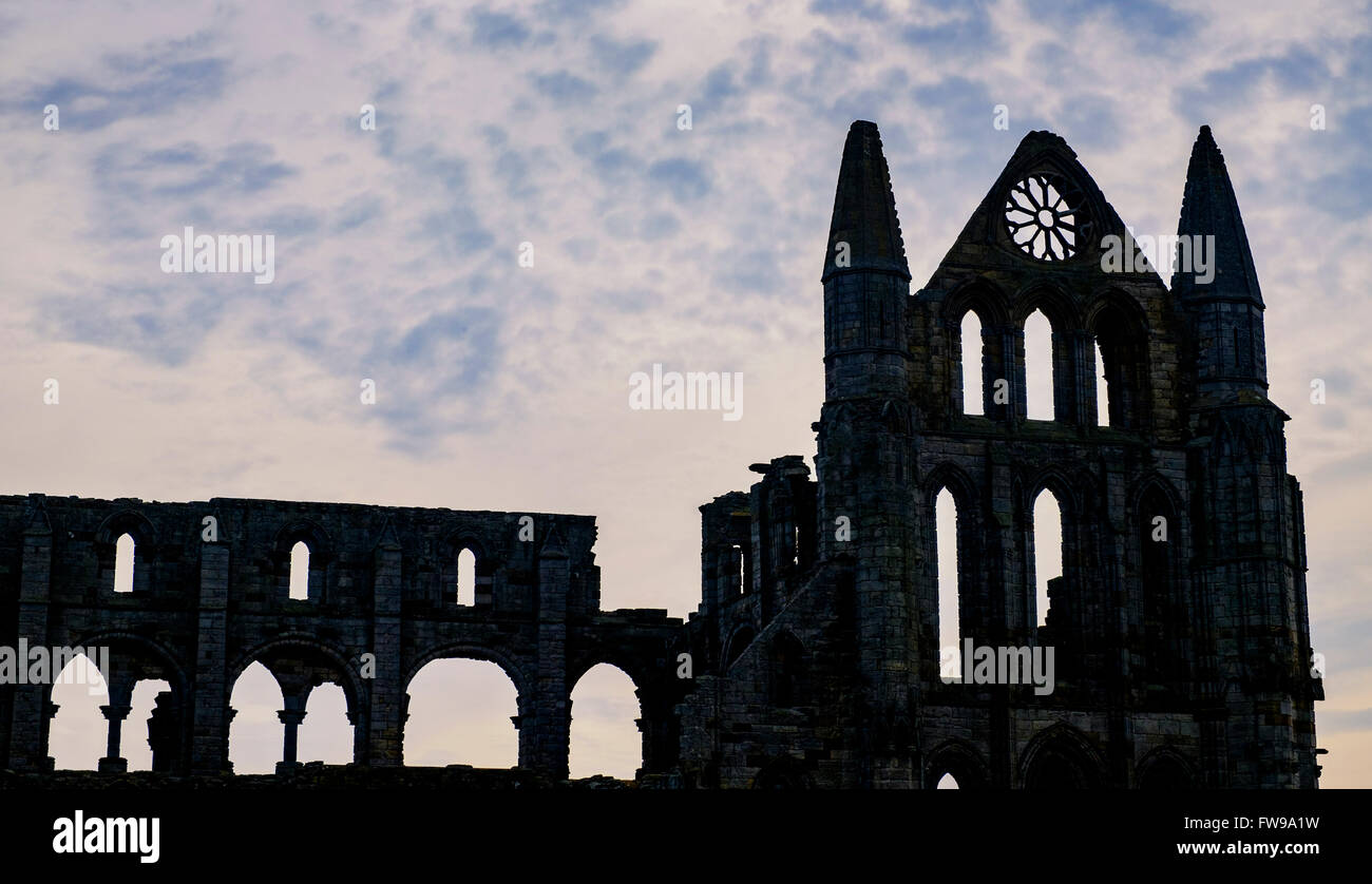 Whitby Abbey - a ruined Benedictine abbey overlooking the North Sea on the East Cliff above Whitby in North Yorkshire, England. Stock Photo