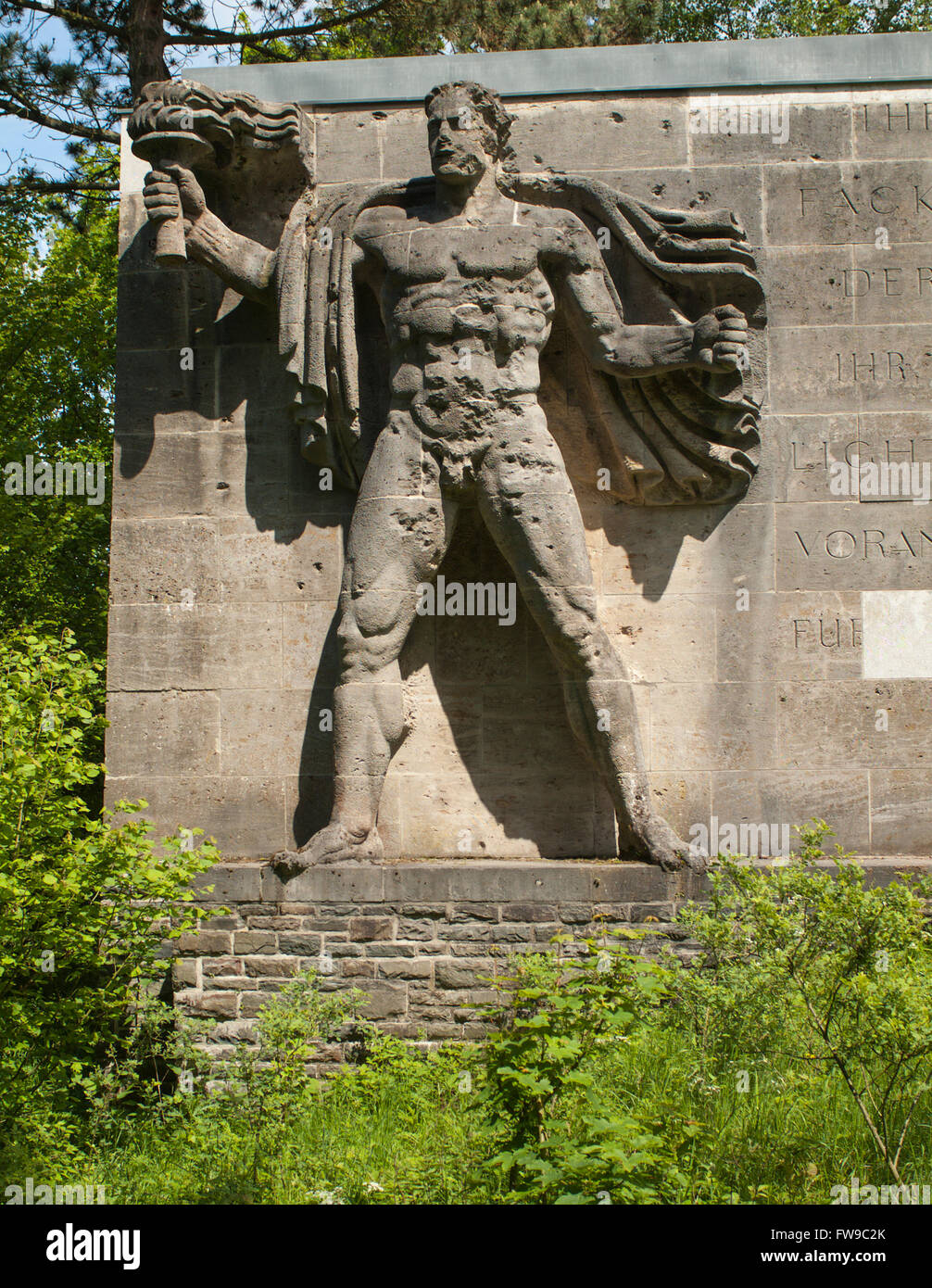 Sculpture torchbearer, representation of the Aryan master race Herrenmensch, Ordensburg Vogelsang, educational centre of the Stock Photo