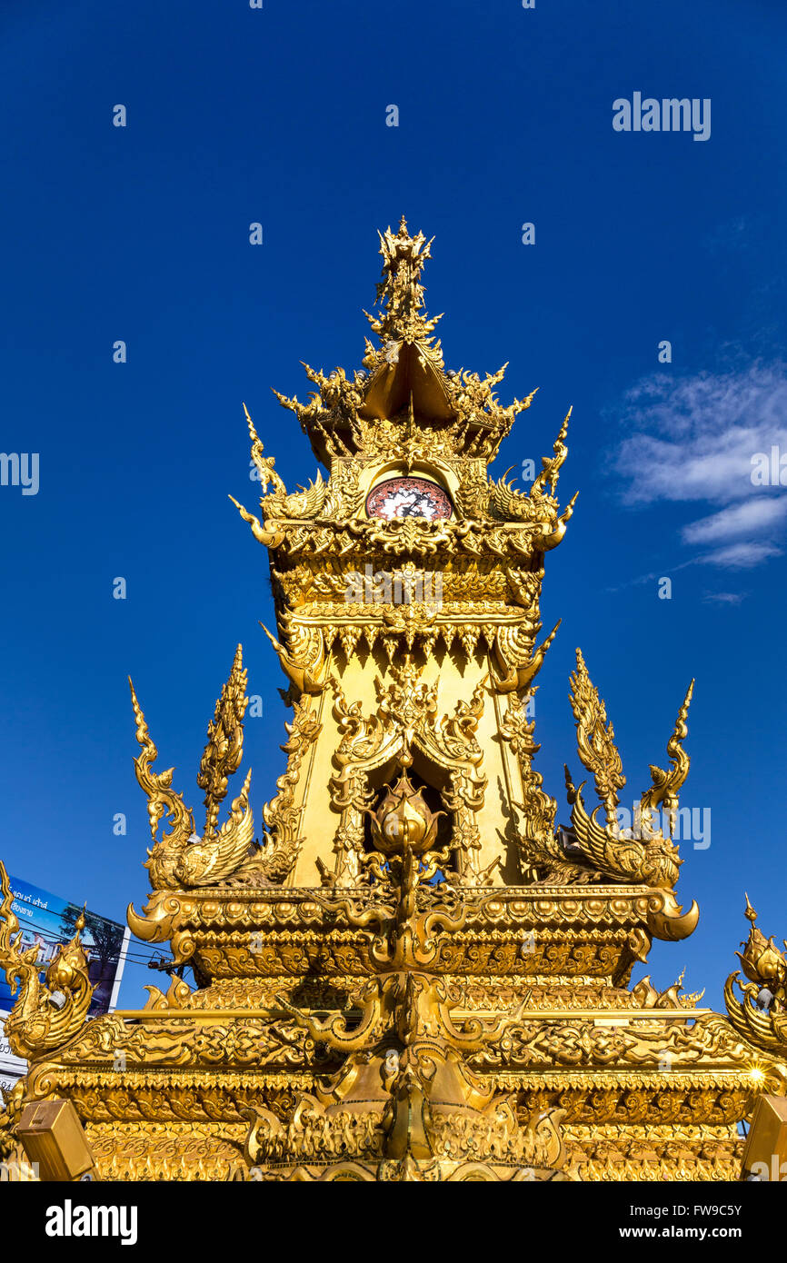 Golden ornate clock tower Ho Nalika at the Thanon Banphaprakan, Chiang Rai Province, Northern Thailand, Thailand Stock Photo