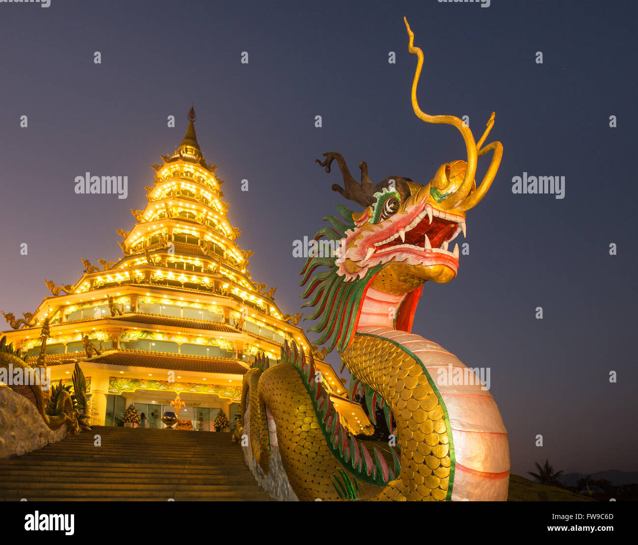 Dragon at the entrance to the Wat Huay Pla Kang temple, Kuan Yin statue, Guan Yin, dragon head, dawn, Chiang Rai Province Stock Photo