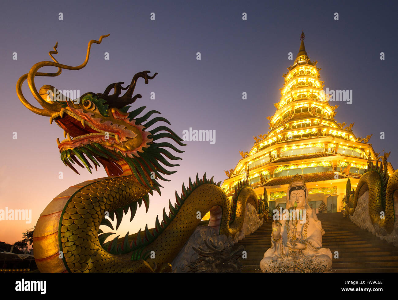 Dragon at the entrance to the Wat Huay Pla Kang temple, Kuan Yin statue, Guan Yin, dragon head, dawn, Chiang Rai Province Stock Photo