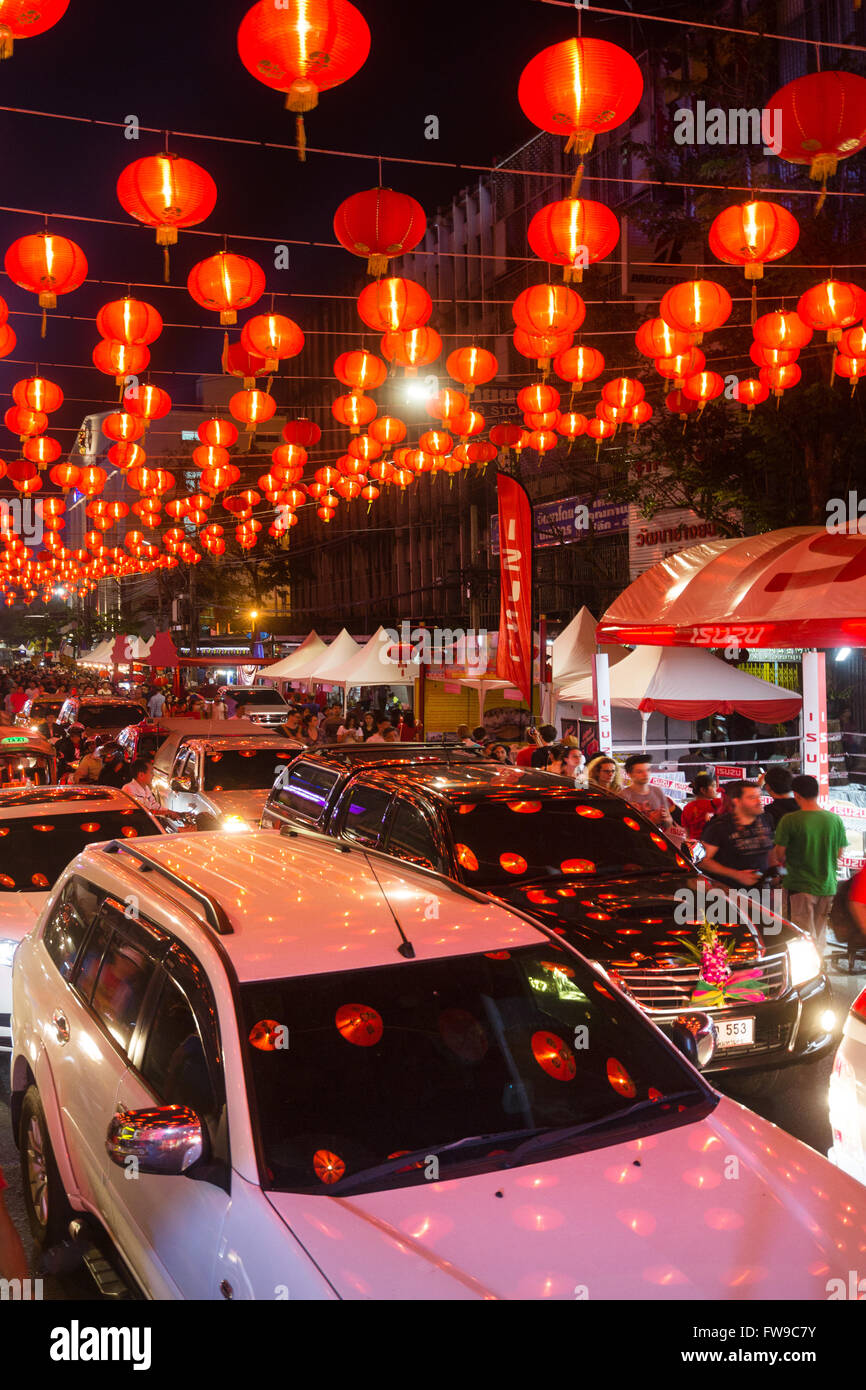 Red chinese lanterns reflecting on cars, Chinese New Year, traffic in Yaowarat Road, Spring festival, Chinatown Stock Photo