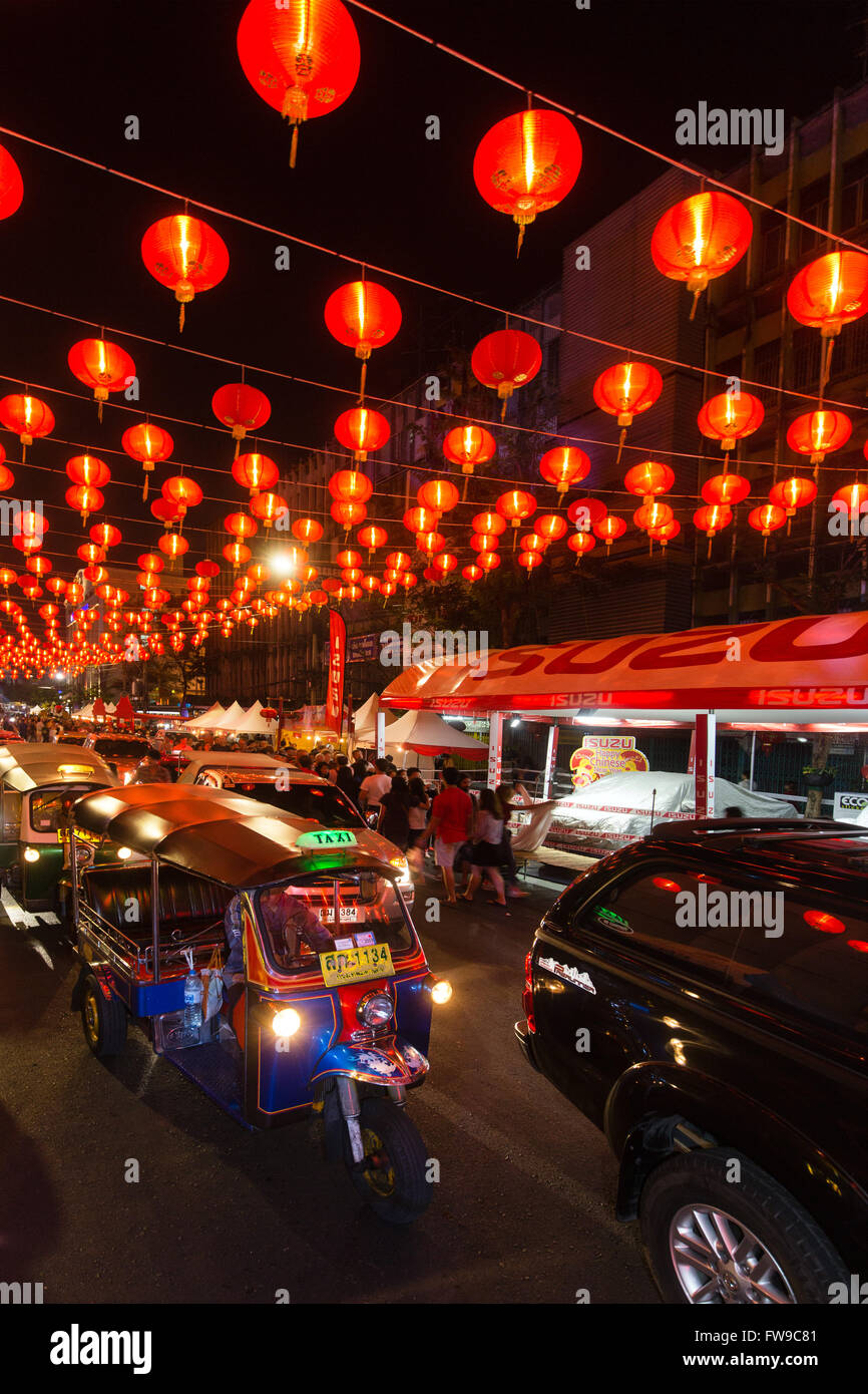 Red chinese lanterns in Yaowarat road, tuk tuks, Chinese New Year, Spring festival, Chinatown, District Samphanthawong, Bangkok Stock Photo