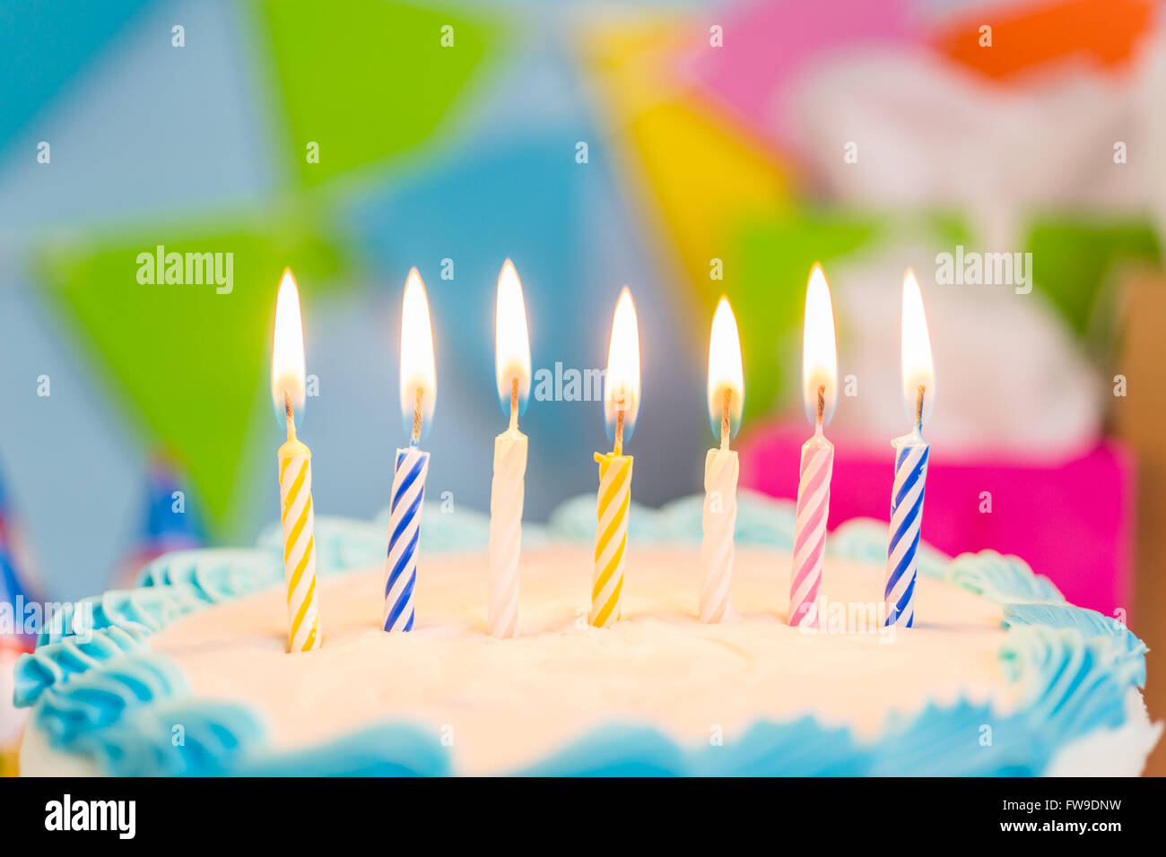 Simple white Birthday cake with cake candles Stock Photo - Alamy