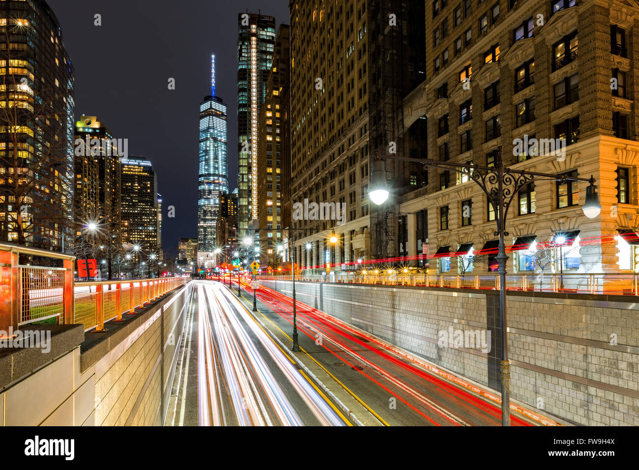 Traffic trails in downtown New York City at the entrance in Battery Park tunnel Stock Photo