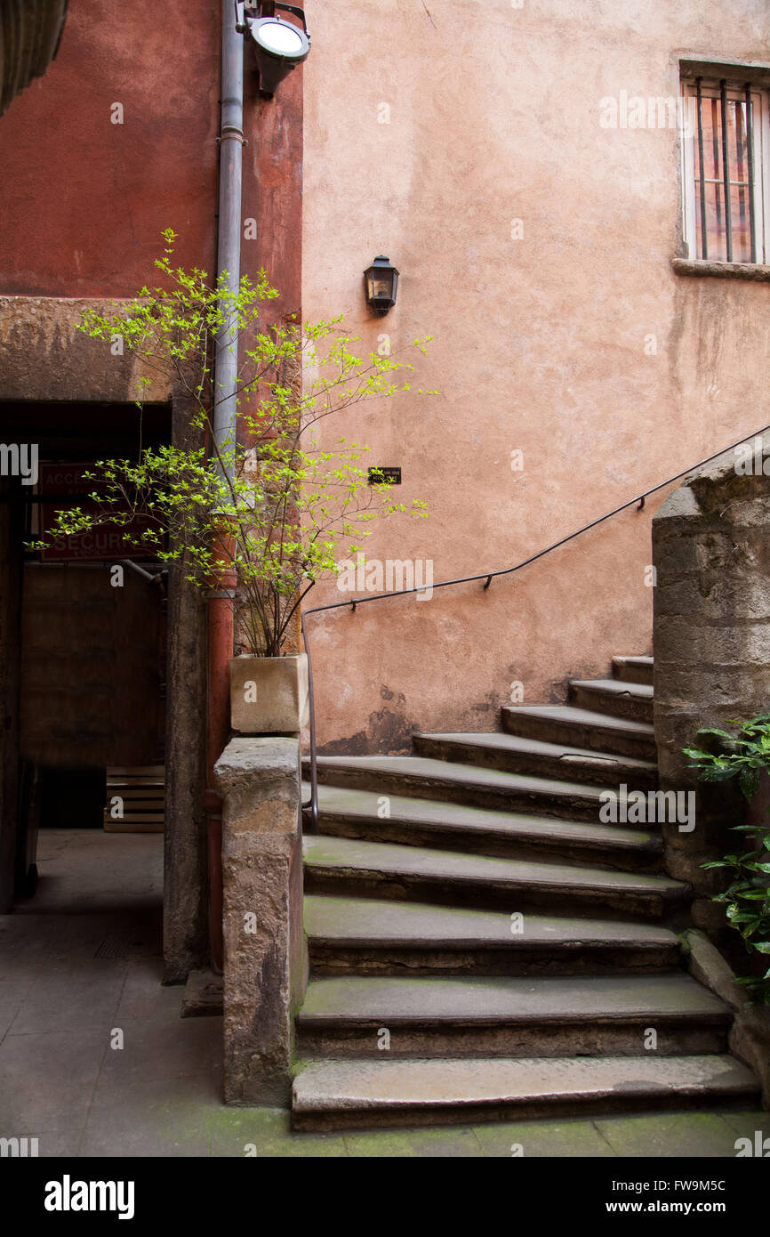 Courtyard at the Long Traboule in old town Vieux Lyon, France. Stock Photo