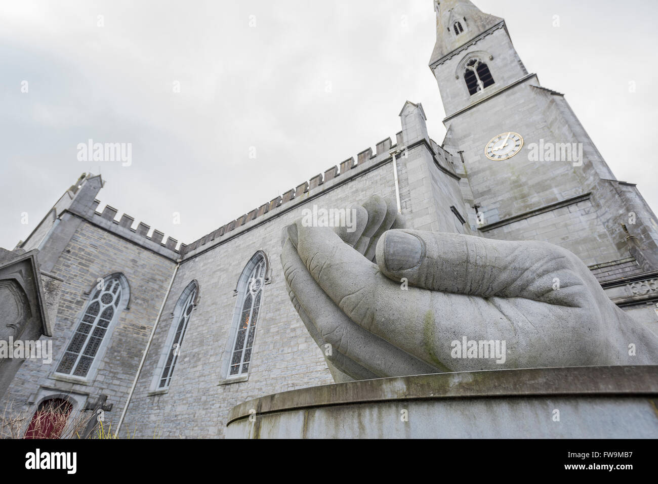 Sculpture of hands by Shane Gilmore in front of Peter & Paul Cathedral