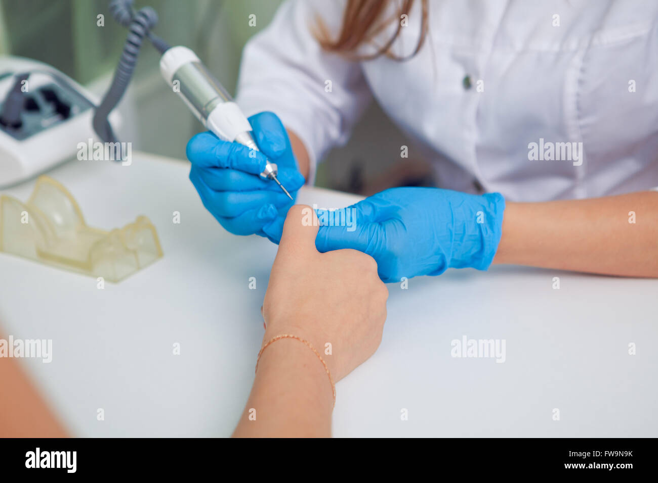 Close up of female hands having manicure Stock Photo