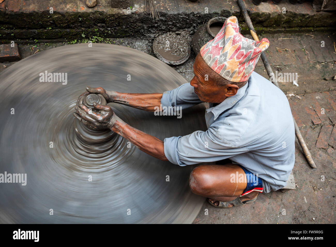 A Nepalese potter making pots from clay in Bhaktapur Nepal Stock Photo