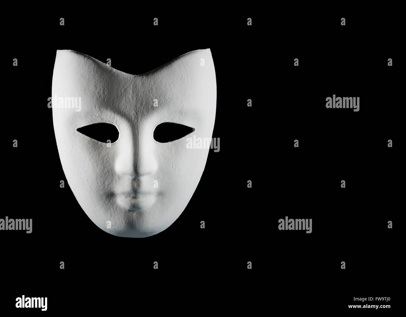 white Italian mask carnival on black background with free space for ...