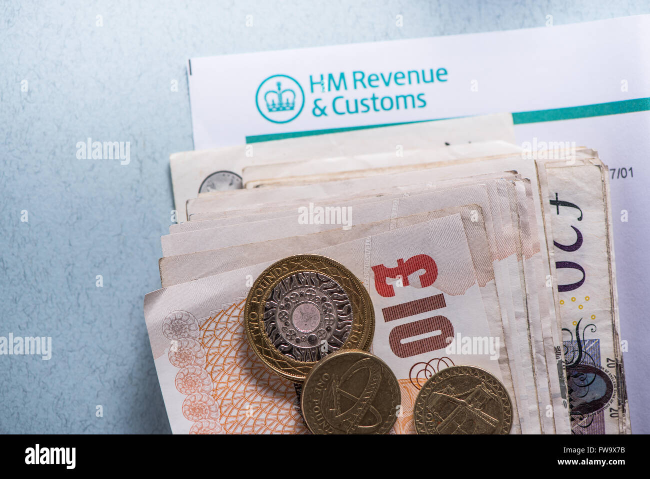 British Tax return for, reminder concept with coins and notes Stock Photo Alamy