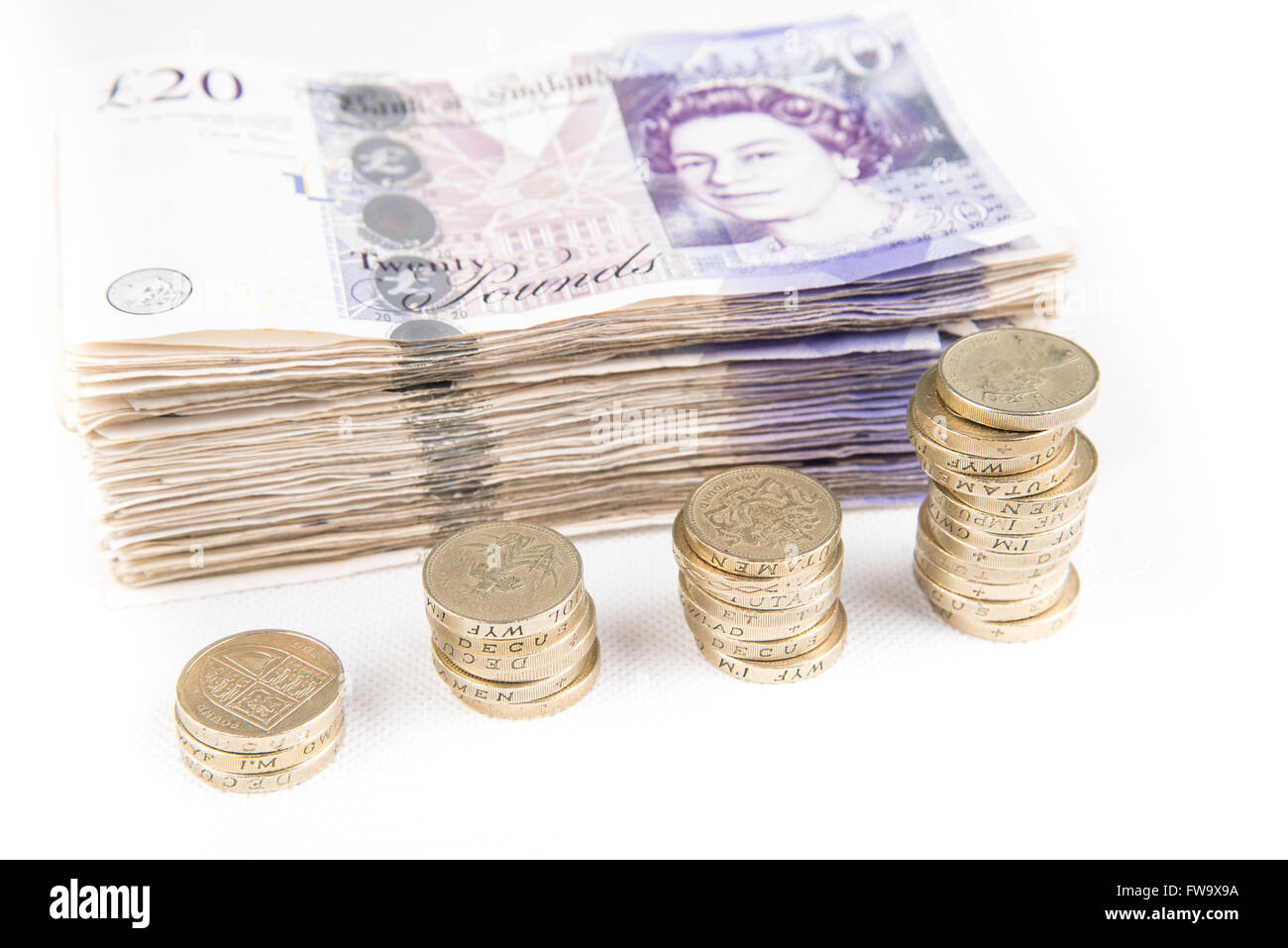 Pound sterling bank notes cash and money on isolated white background ...