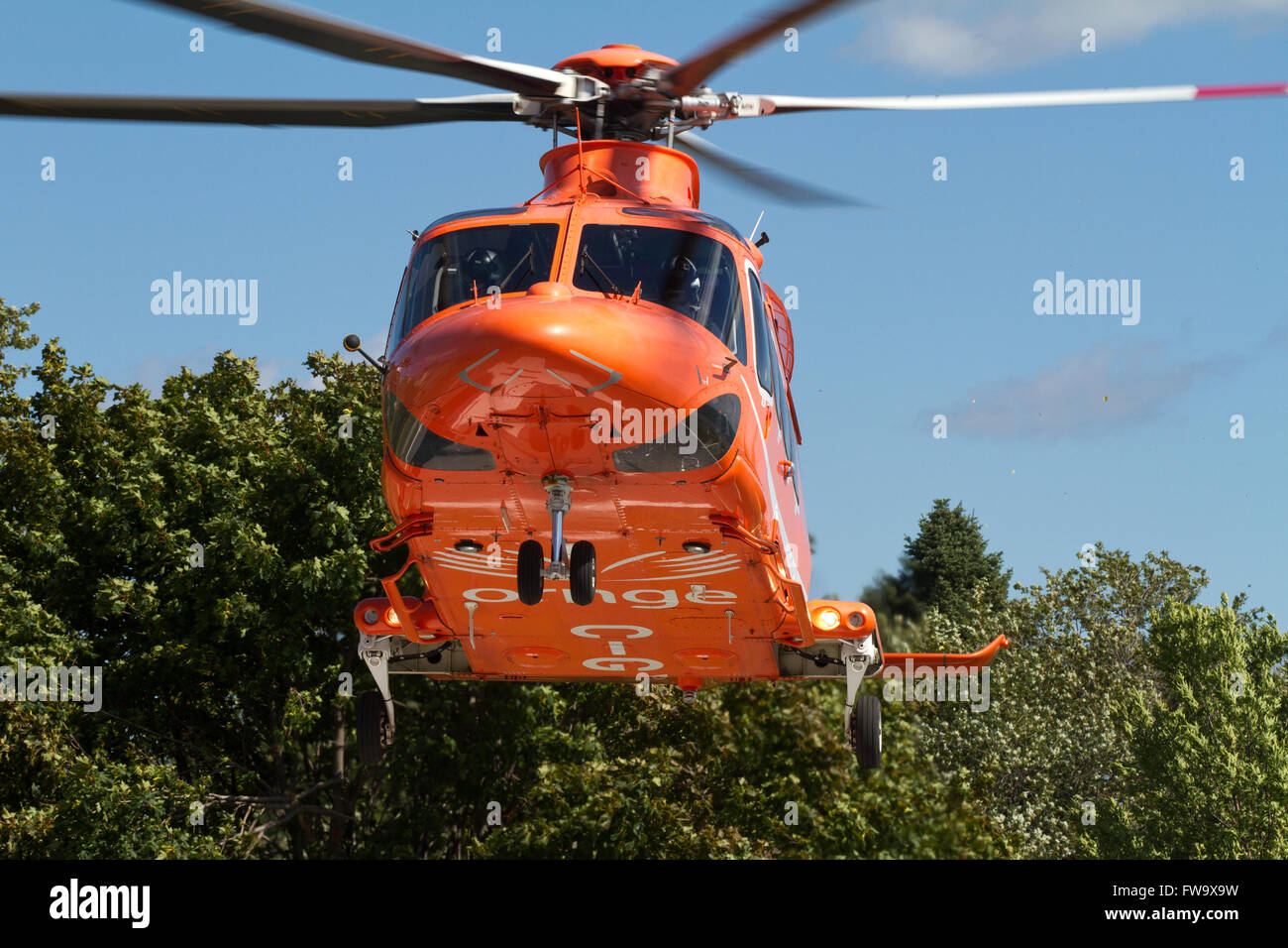 An Ornge air ambulance stands on a helipad near Kingston General Hospital(KGH) in Kingston Ont., on Thursday Aug. 14, 2015. Stock Photo