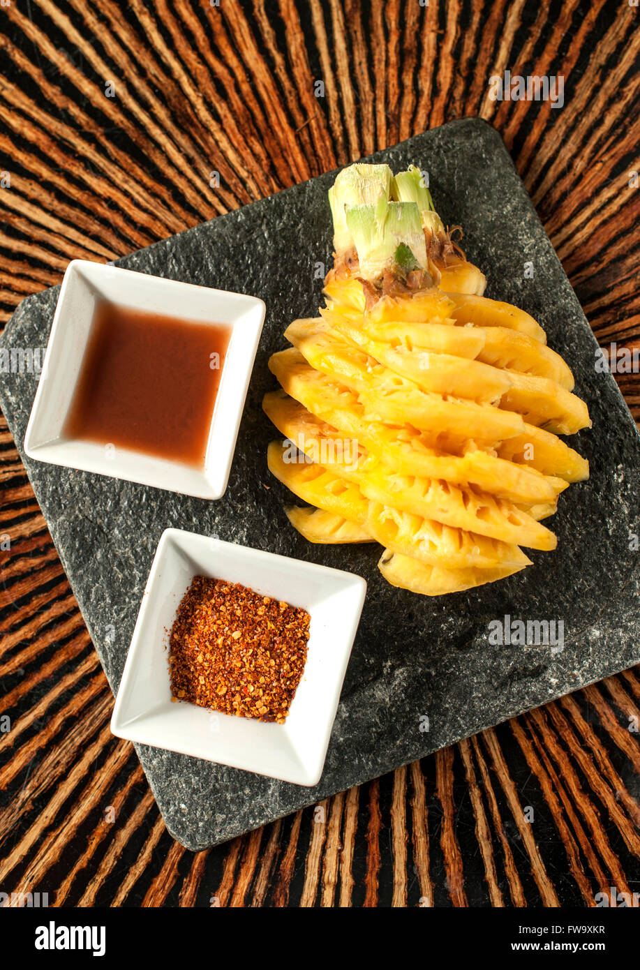 Pineapple with tamarind sauce and chili powder as served by the Four