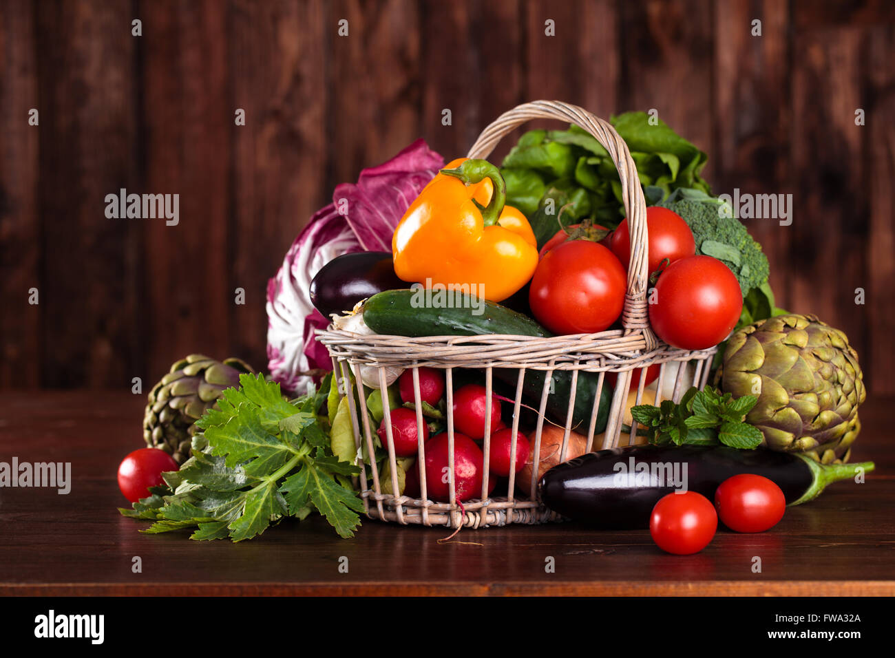 Fresh vegetables and in basket Stock Photo - Alamy