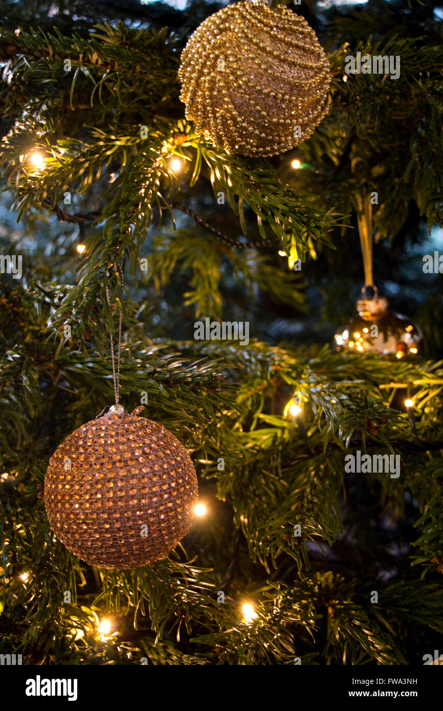 Christmas Tree with gold and brown coloured baubles Stock Photo