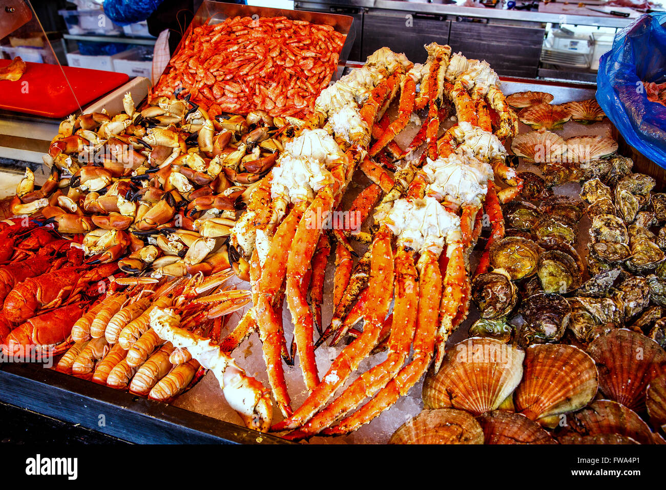 Various seafood on the shelves of the fish market in Norway, Bergen Stock Photo