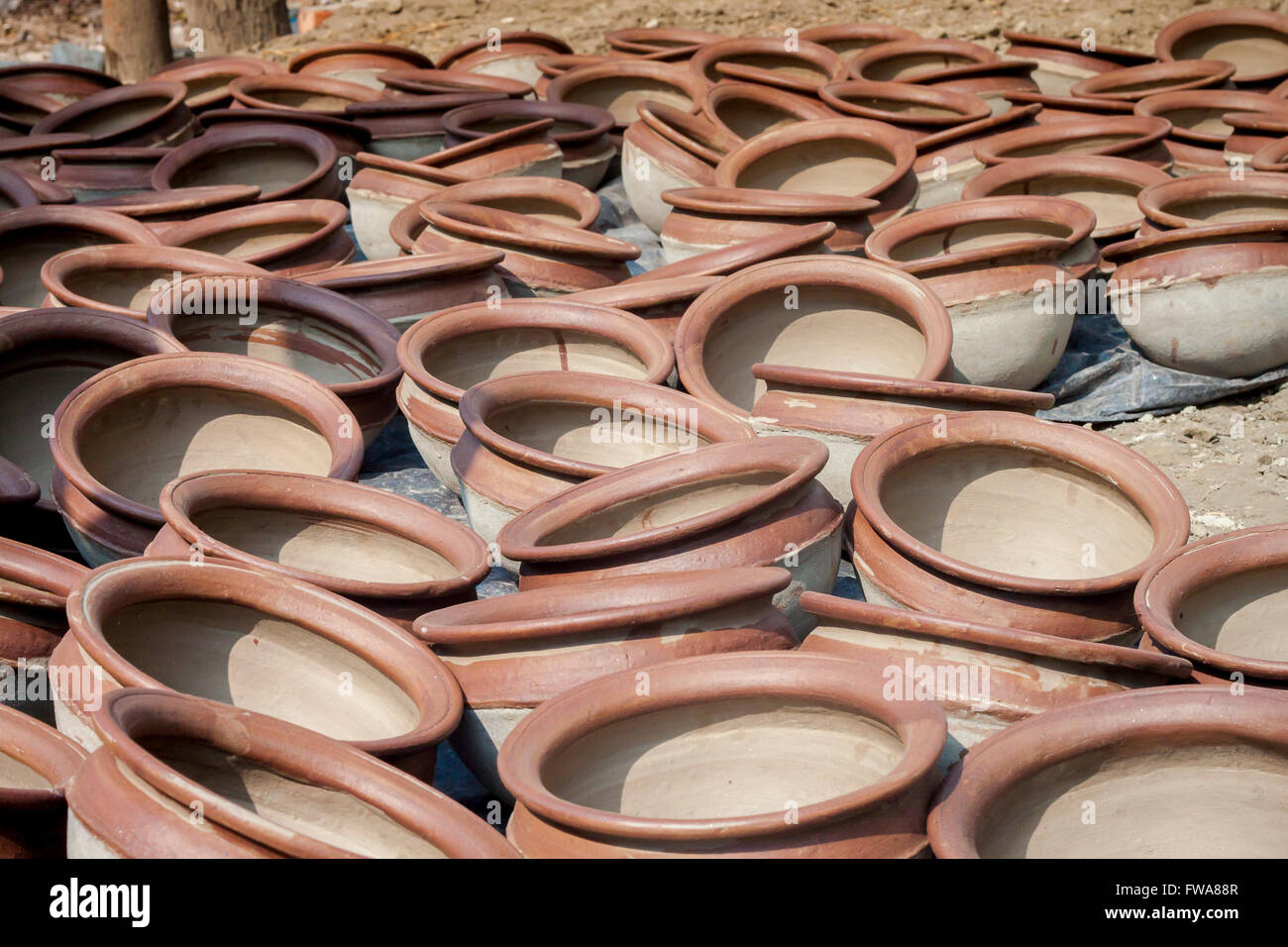 Potter making them pots using clay near of Gazipur, Dhaka, Bangladesh
