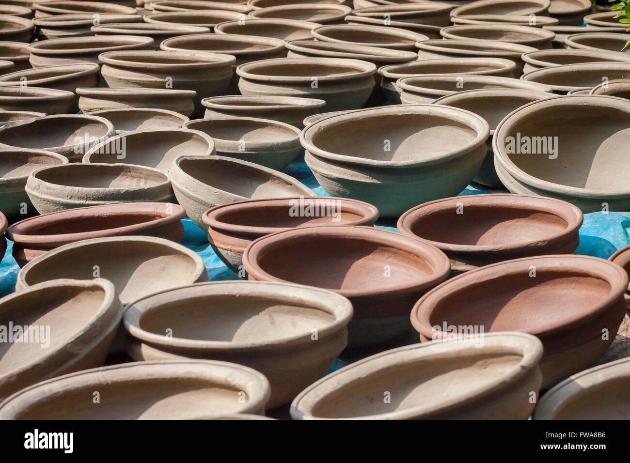 Potter making them pots using clay near of Gazipur, Dhaka, Bangladesh