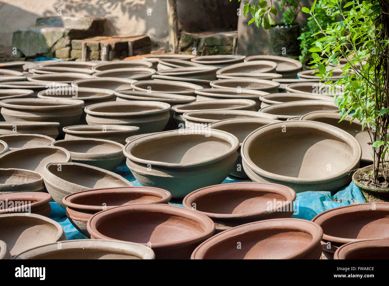 Potter making them pots using clay near of Gazipur, Dhaka, Bangladesh