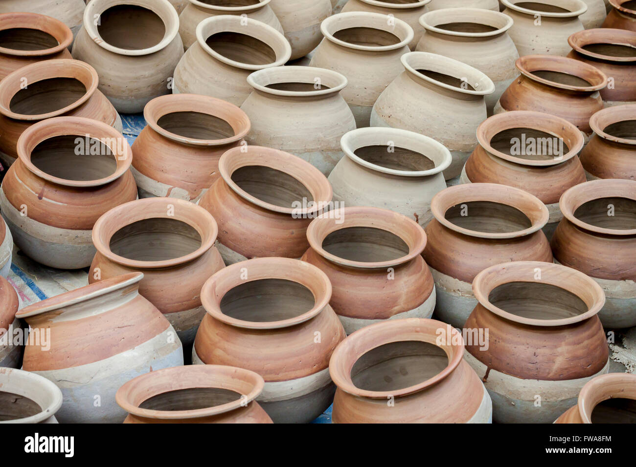 Potter making them pots using clay near of Gazipur, Dhaka, Bangladesh