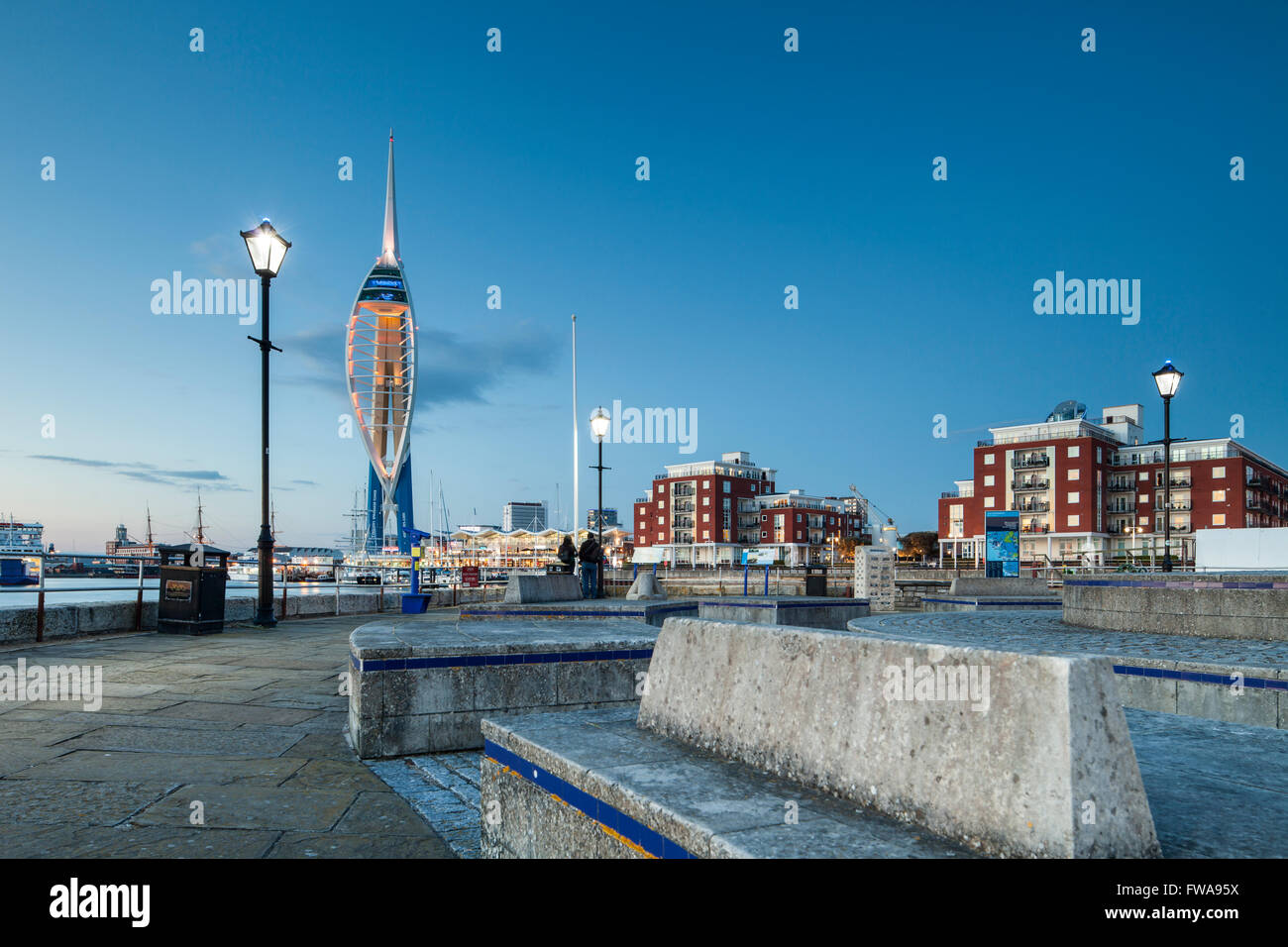 Night falls in Portsmouth, UK. Spinnaker tower in the distance. Stock Photo