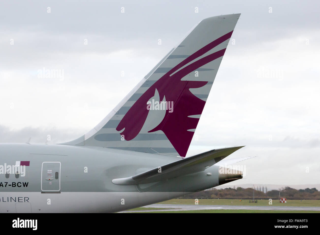 Tail of Qatar Airways Boeing 787-8 Dreamliner wide-body passenger plane (A7-BCW). Stock Photo