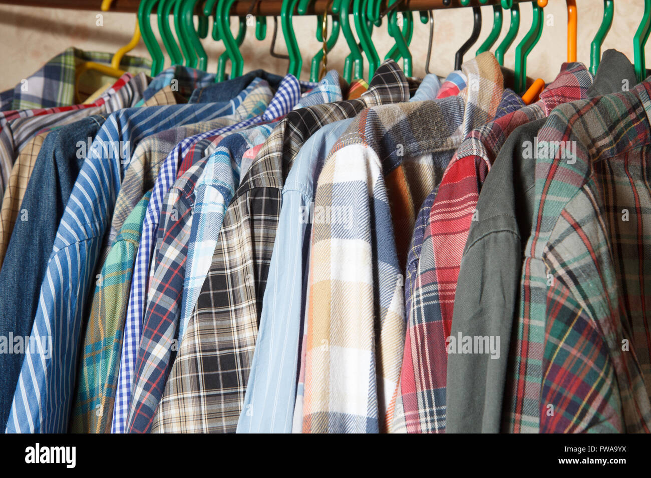 Men's shirts on hangers Stock Photo Alamy