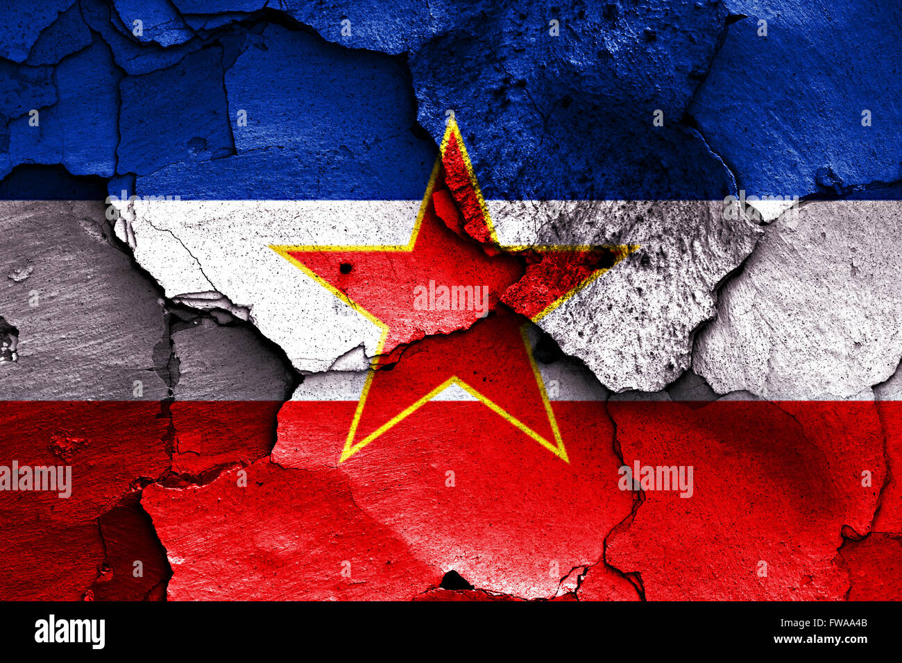 flag of Yugoslavia painted on cracked wall Stock Photo