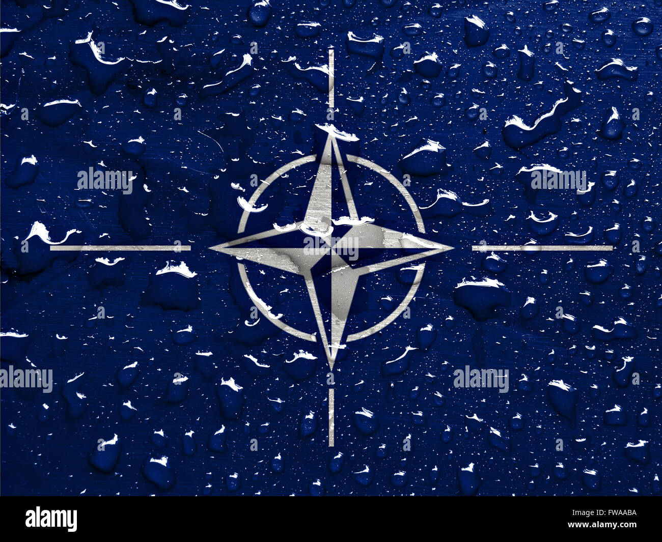 flag of NATO with rain drops Stock Photo