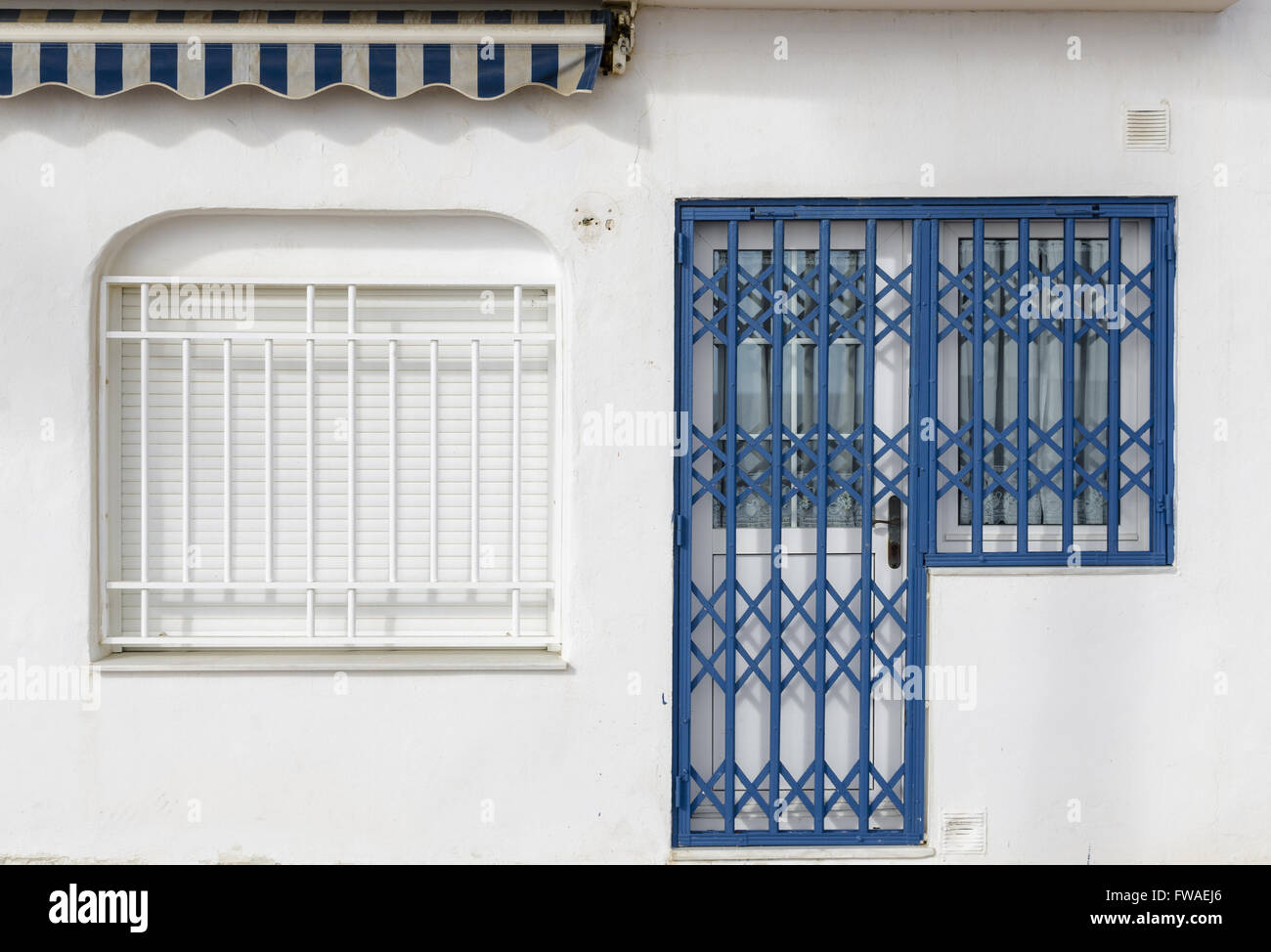 A closed door view in Carboneras village, Almeria province, Spain Stock Photo