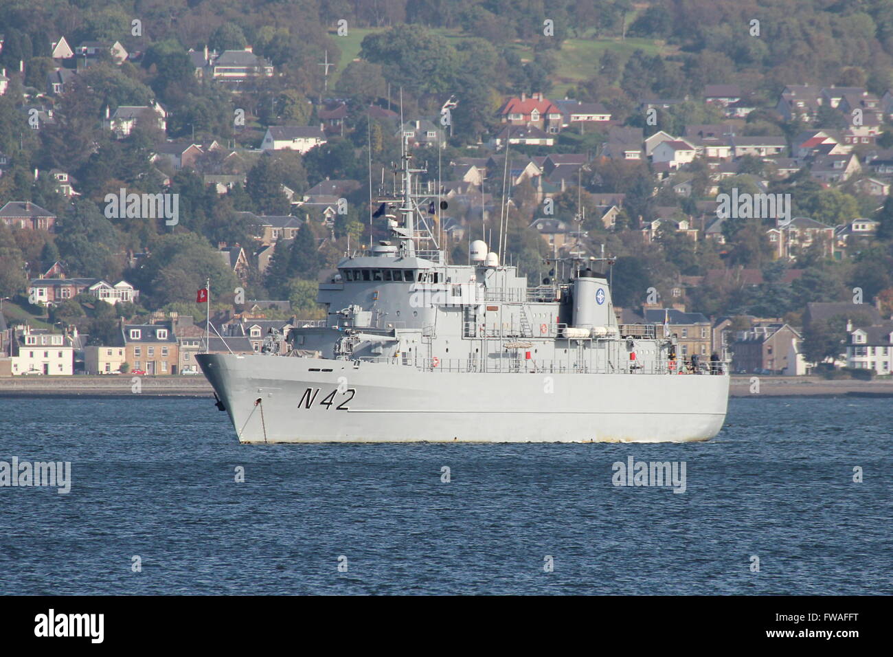 LNS Jotvingis of the Lithuanian Navy, is seen here anchored off Greenock before participating in Exercise Joint Warrior 14-2. Stock Photo