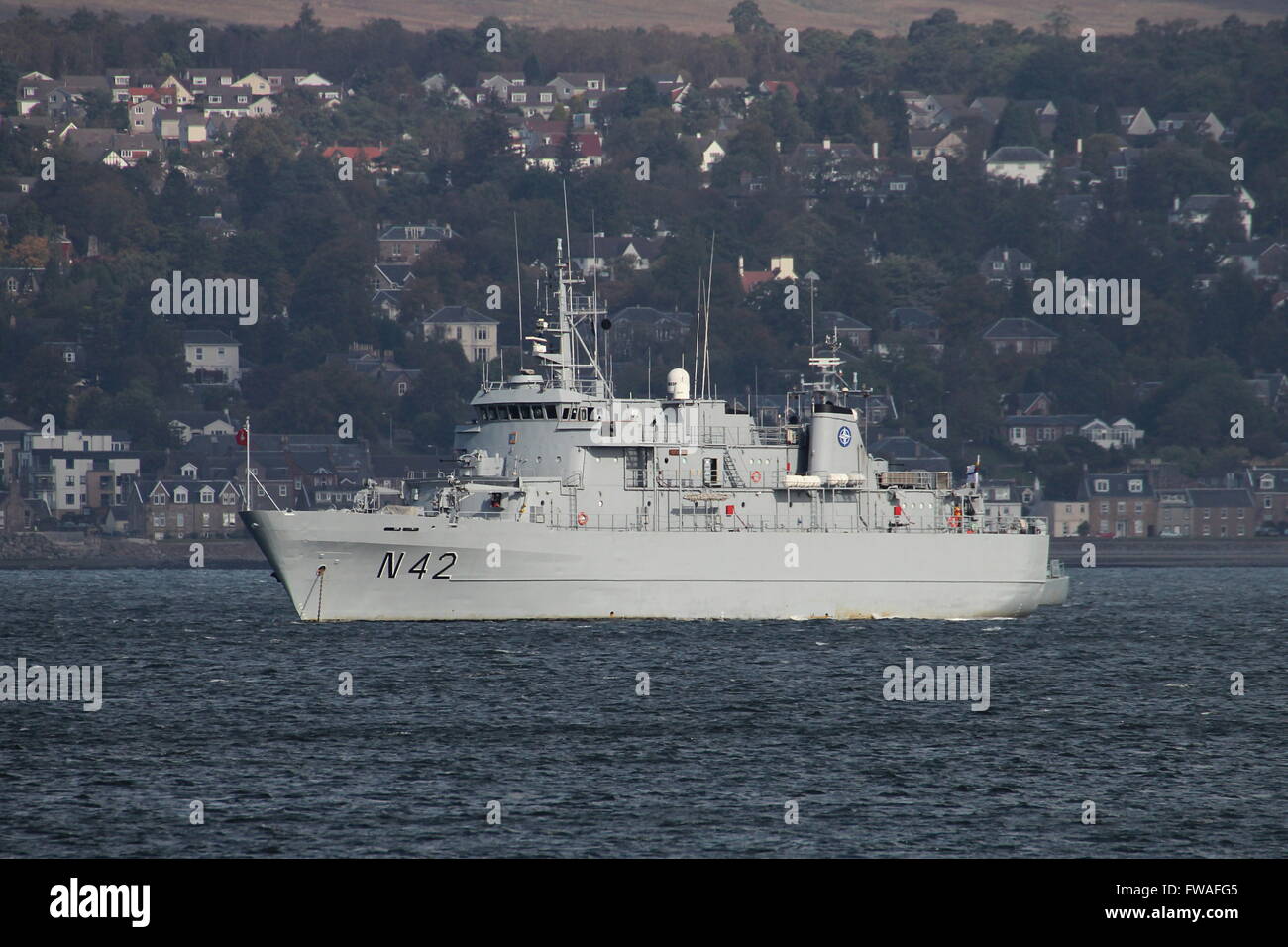 LNS Jotvingis of the Lithuanian Navy, is seen here anchored off Greenock before participating in Exercise Joint Warrior 14-2. Stock Photo