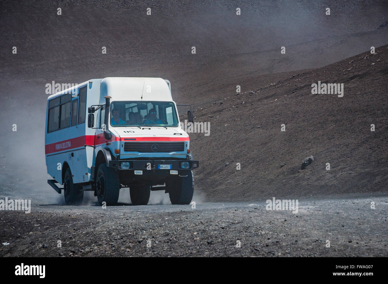 Shuttles to bring tourists to nearby crater. Mount Etna volcano. Nicolisi, Catania, Sicily, Italy Stock Photo