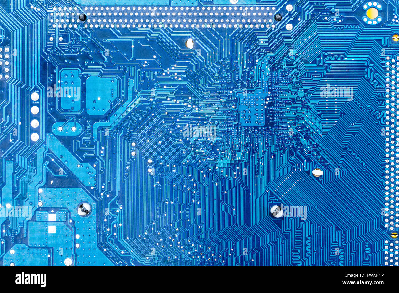 Electronic circuit board close up. blue PCB Stock Photo