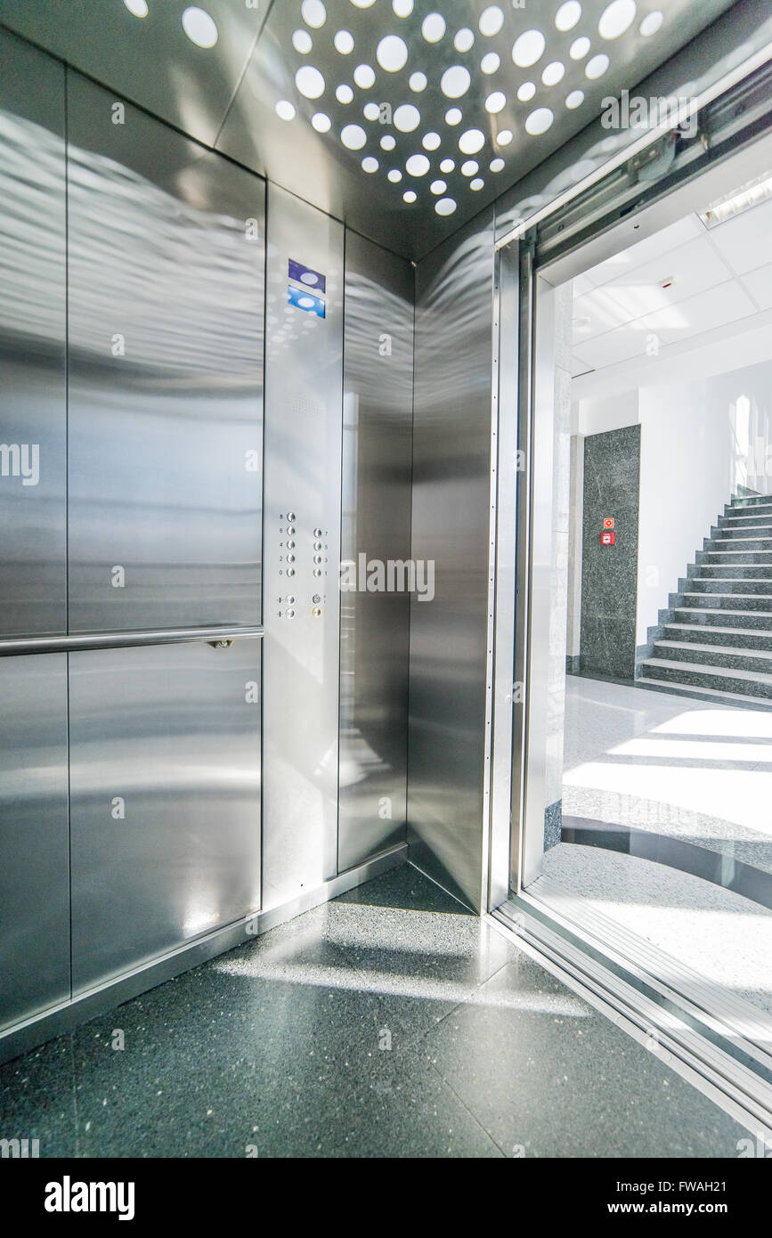 interior of a modern elevator - shiny steel and lighting Stock Photo