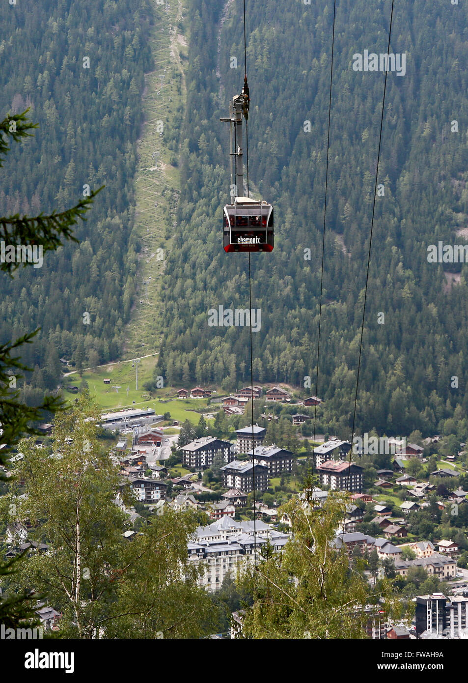 The Aiguille du Midi cable car over the town of Chamonix, HauteSavoie, France Stock Photo Alamy