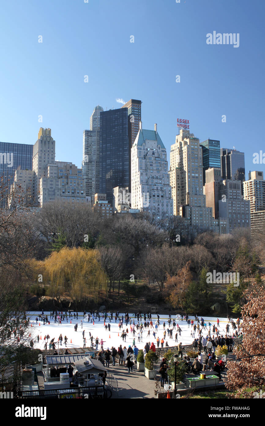 Central Park ice rink, New York City, USA. Used in many Christmas movies the rink has become an iconic symbol of Xmas in NYC. Stock Photo