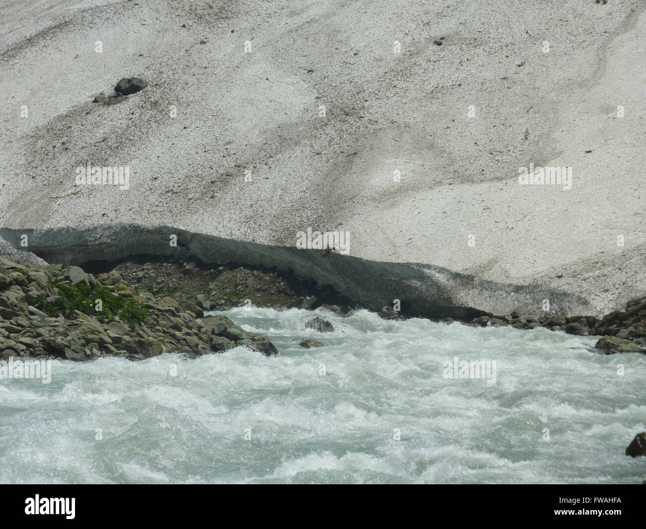 Thajwas glacier, above Sonamarg, Kashmir, used for skying and sledging but often unstable and dangerous in ravines, stream Stock Photo