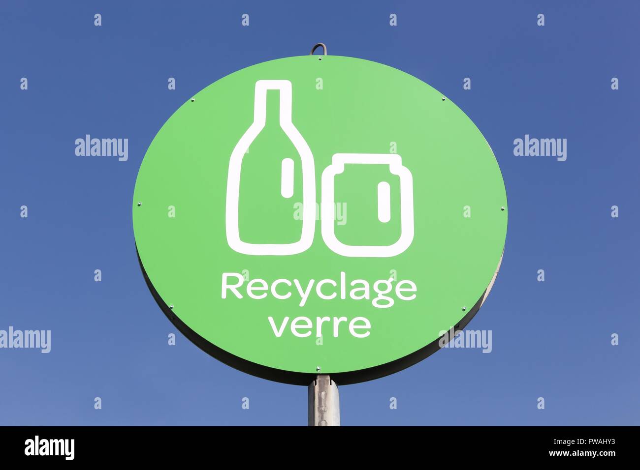 Glass recycling sign in France Stock Photo