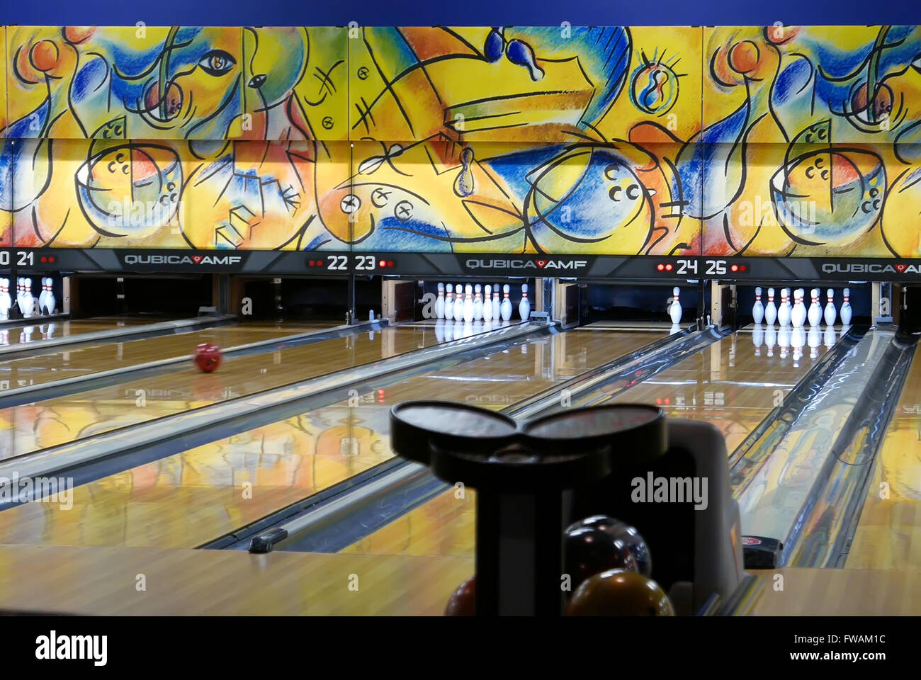 Close up ball rolls down a bowling lane Stock Photo