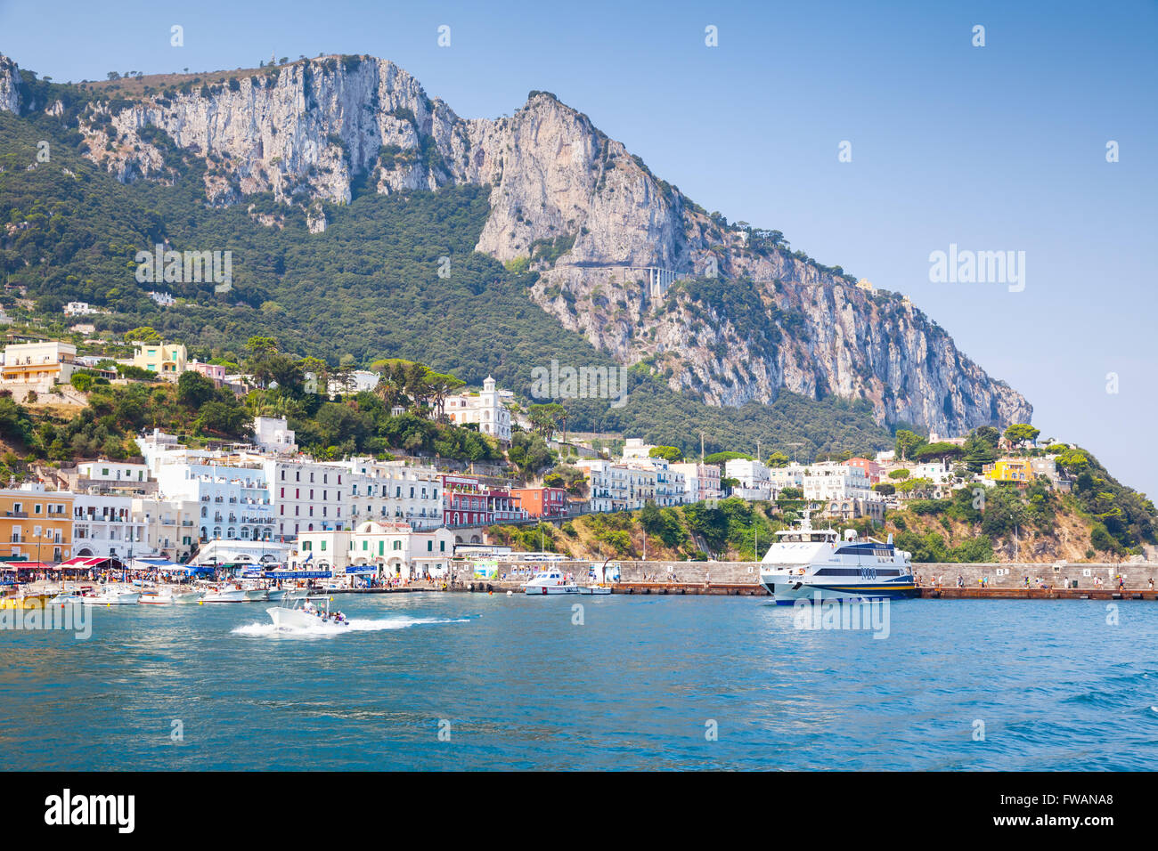 Capri, Italy - August 14, 2015: Port of Capri island in a summer day, Italy, Tyrrhenian Sea, Bay of Naples Stock Photo
